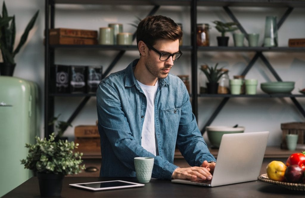 man-with-laptop Man with laptop in work space