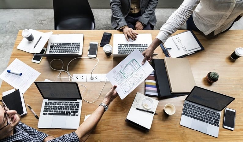 Group of people working on website template Group of people working on website template