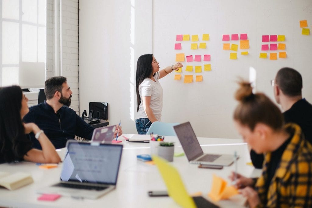 jason-goodman-Oalh2MojUuk-unsplash Work meeting with sticky notes